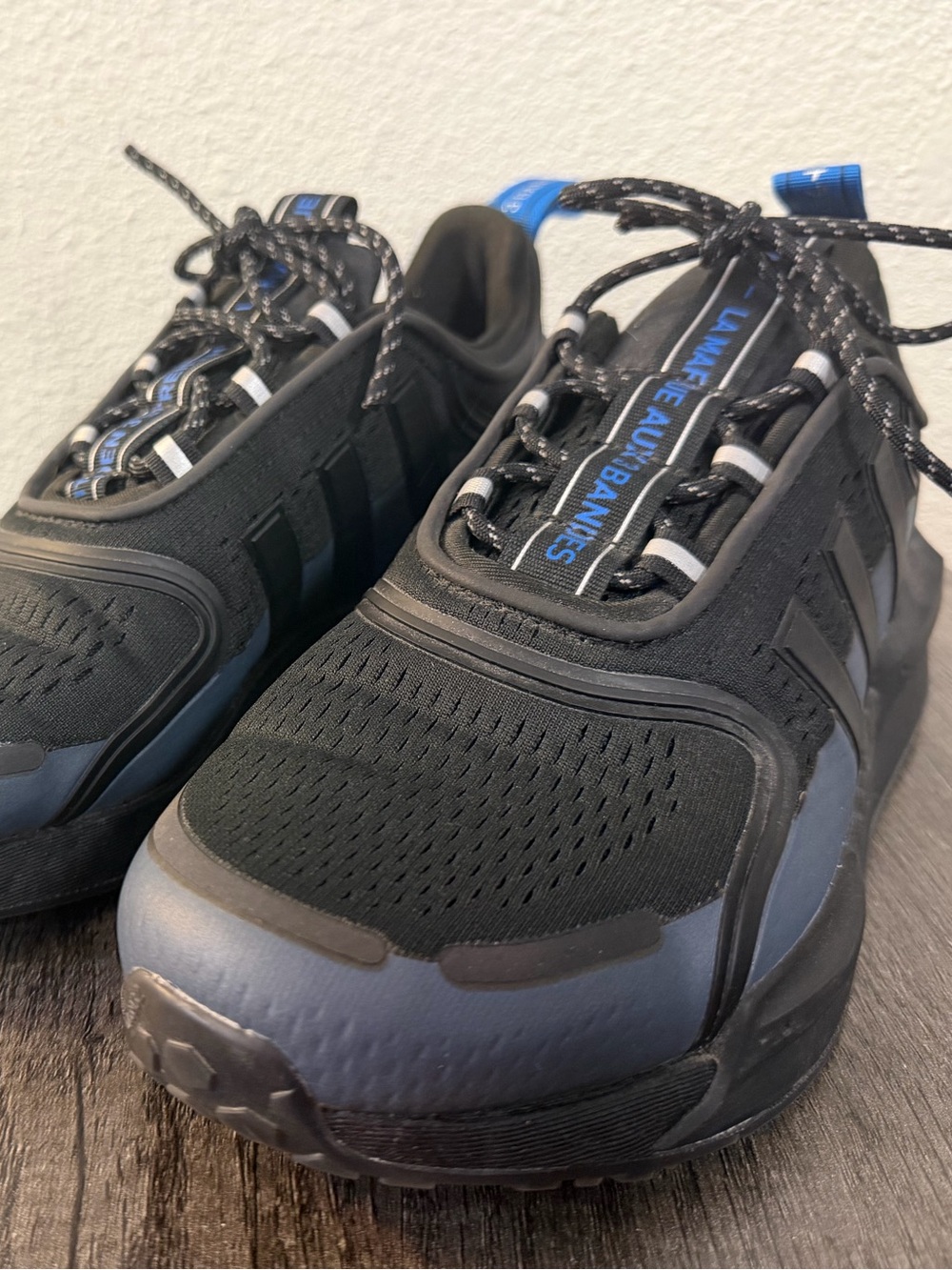 adidas Men's Black Athletic Sneakers with Blue Accents